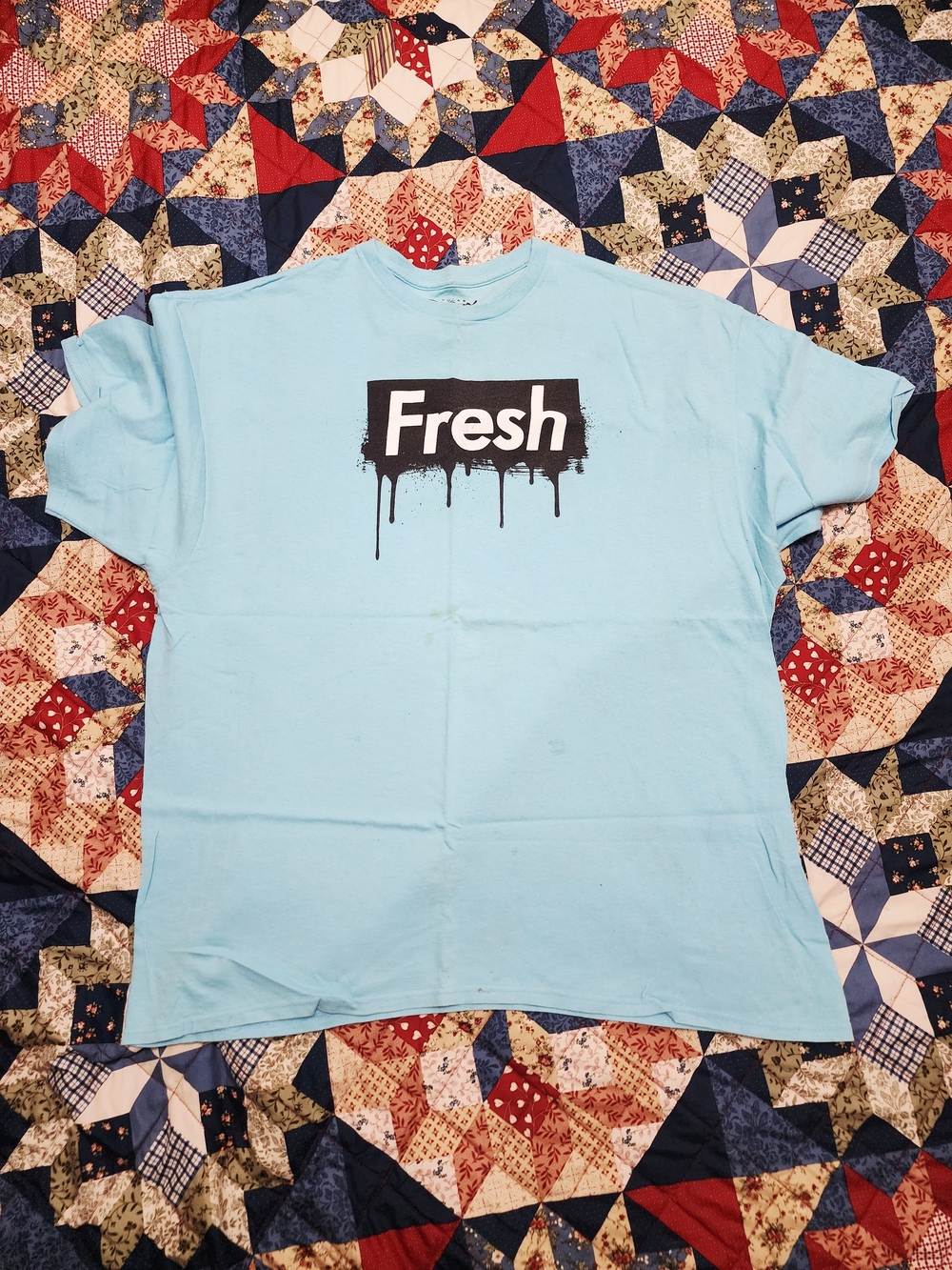 Popular Poison Light Blue Graphic Tee with Black 'Fresh' Drip Logo